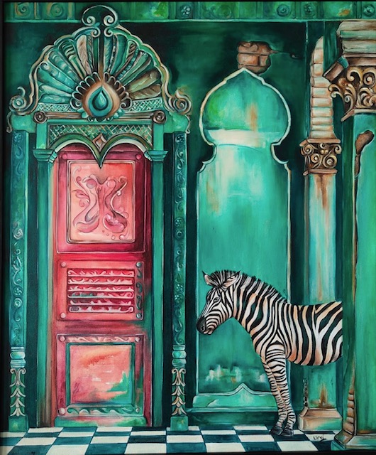 A zebra beside a pink door in a turquoise architectural setting.